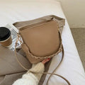 Retro woven PU bucket bag in khaki colour shown as crossbody and underarm bag
