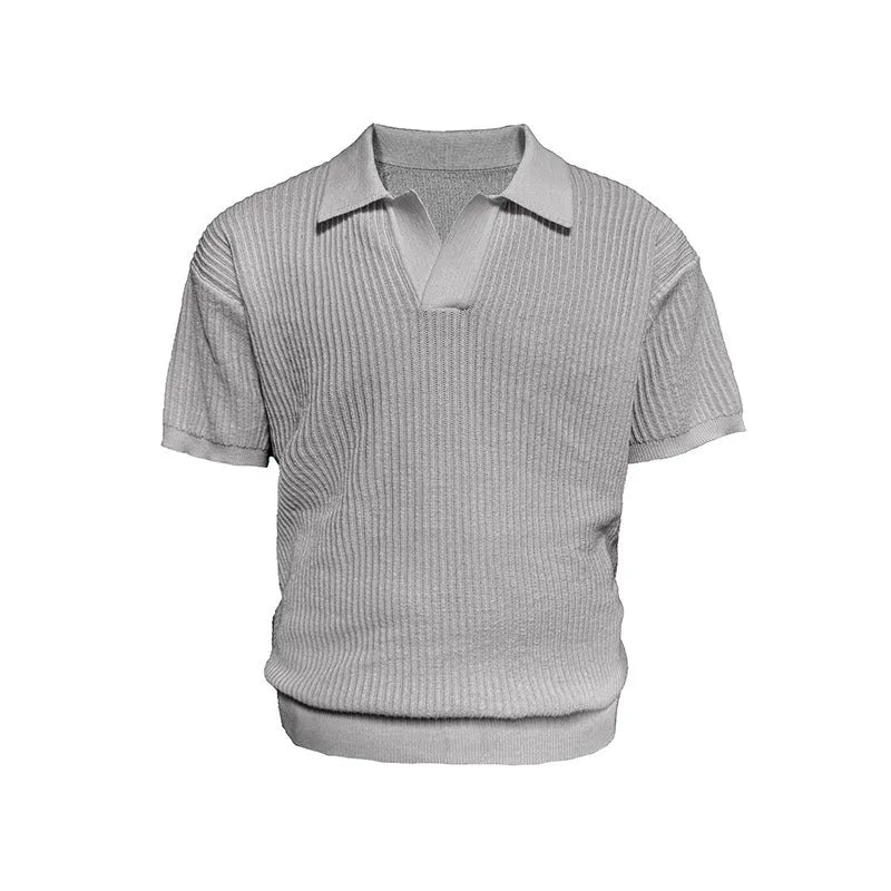 Man wearing a creamy white short-sleeve polo shirt with a business collar and subtle stripes.