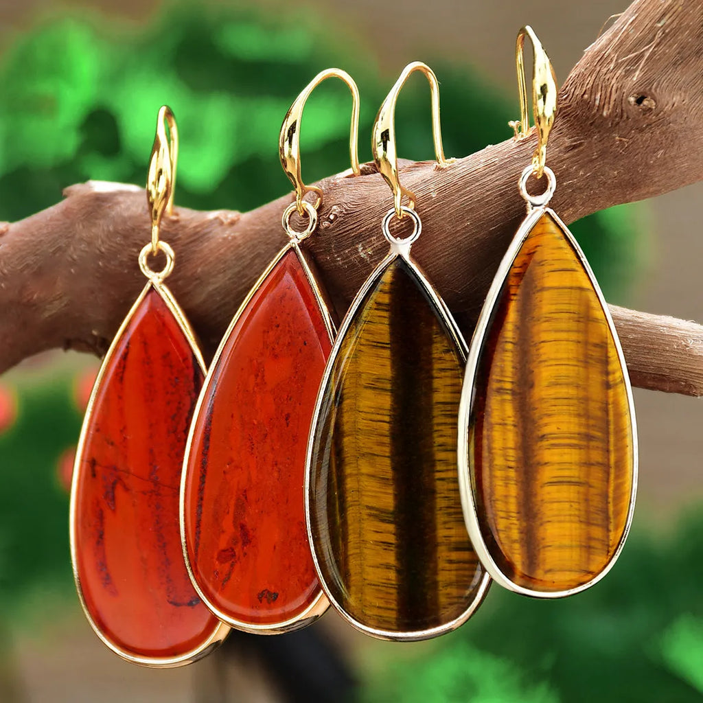 Vintage tigereye stone drop earrings with elongated water drop shape and textured elements