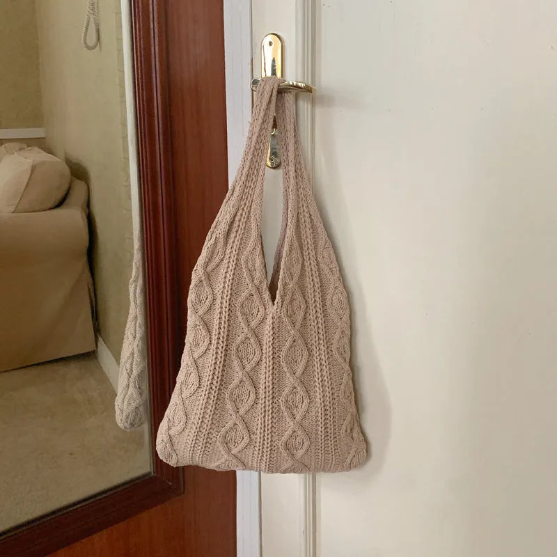 Retro hollow knitted polyester tote bag in a solid colour with double shoulder straps.