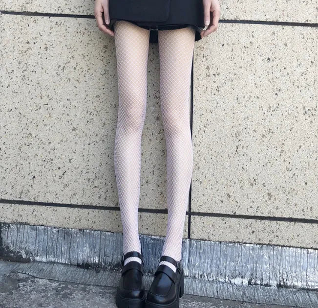 Women's summer mesh stockings in black and white, showing large, medium, and small net patterns.