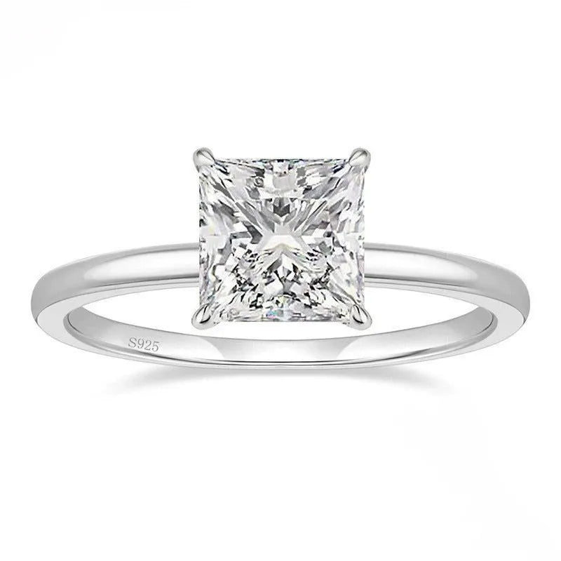 Simple geometric women's ring in 925 silver with a round zirconia stone, shown in silver, gold, and rose gold finishes.