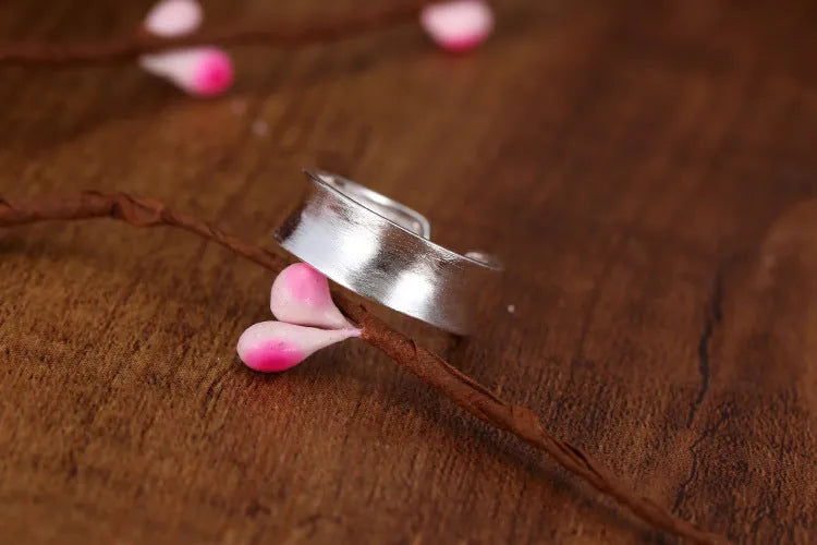Geometric open sterling silver ring with frosted finish and adjustable opening