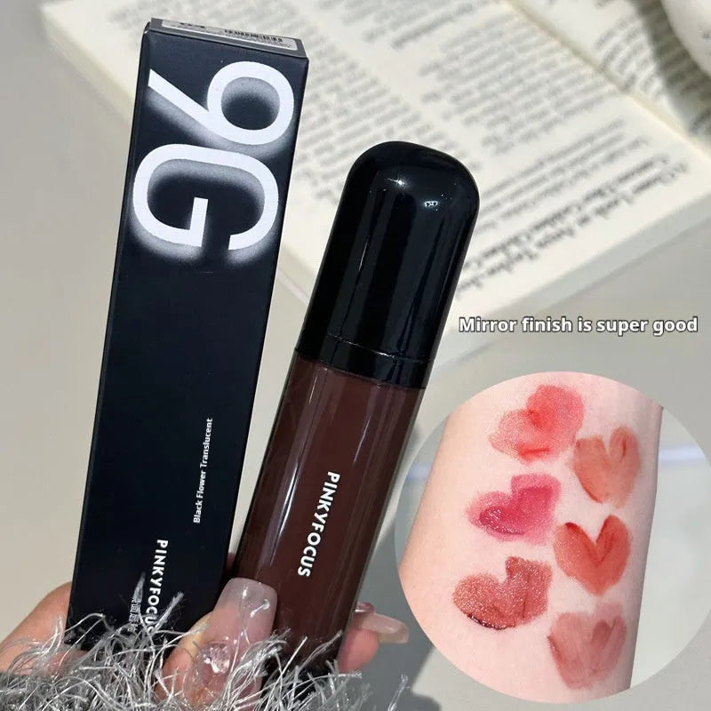 Black shiny Mirror Lip Paint lacquer with six Black Citrus colour options including tomato and sweet potato shades
