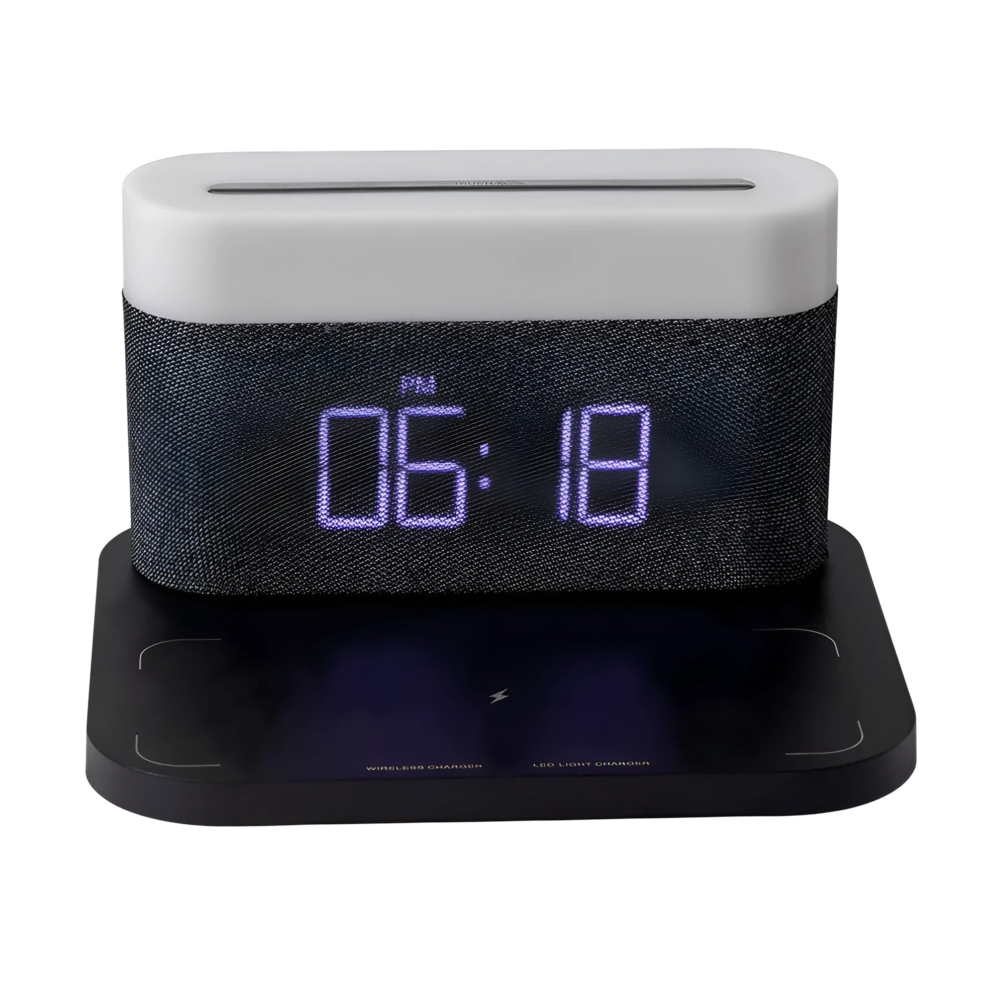 Black wireless charging desk clock with LED display and night light on wooden surface