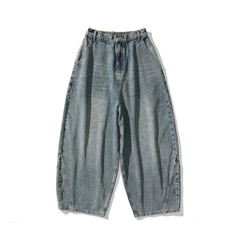 Men's plus-size light blue baggy jeans with a straight leg and zip fly