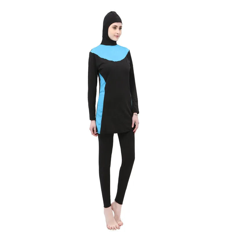 Conservative women's hooded swimsuit with long sleeves in black with rose red colour combination