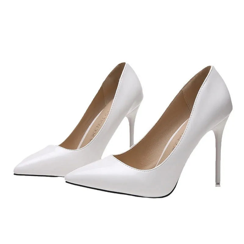 Women's pointed toe stiletto high heels in apricot colour with buckle detail and 8cm heel.