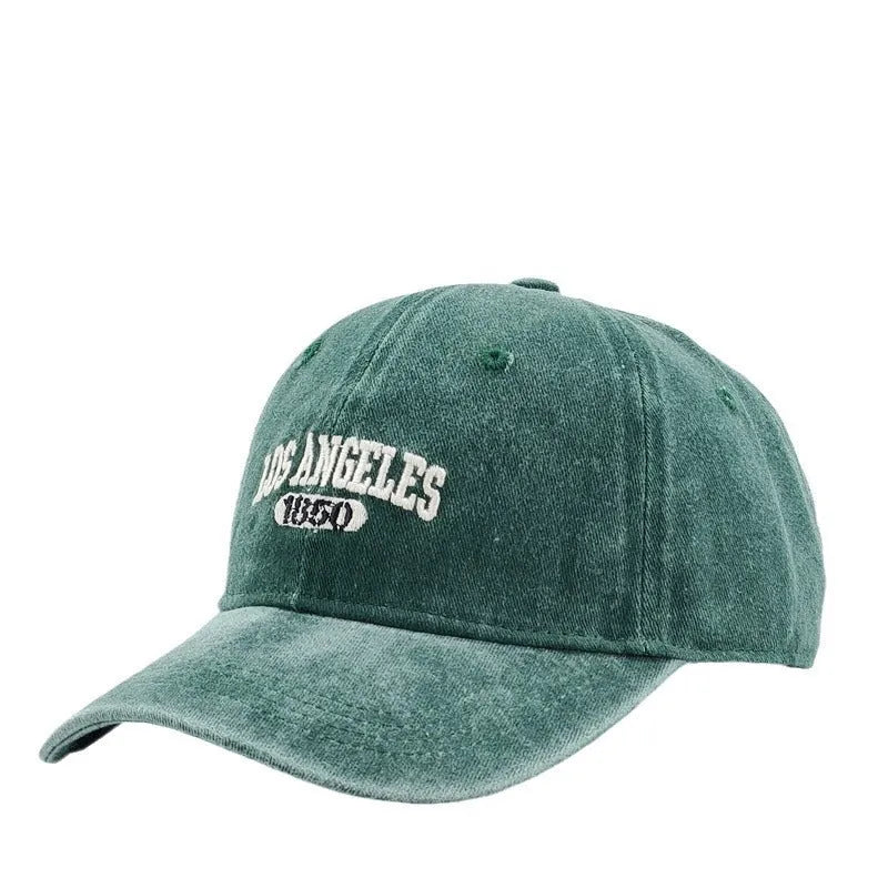 Personalised embroidered retro-style peaked cap in distressed beige with adjustable strap