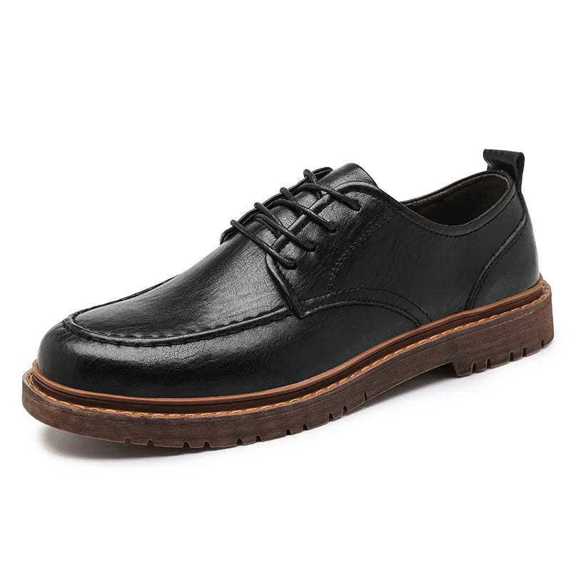 Men's black and brown casual leather shoes with round toe and flat rubber sole.