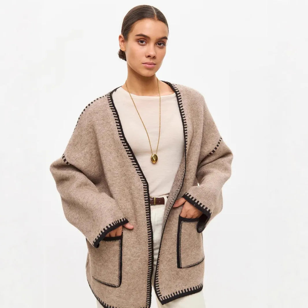 Lace-up front knitted cardigan in imitation cashmere fabric showing loose fitting design and long sleeves