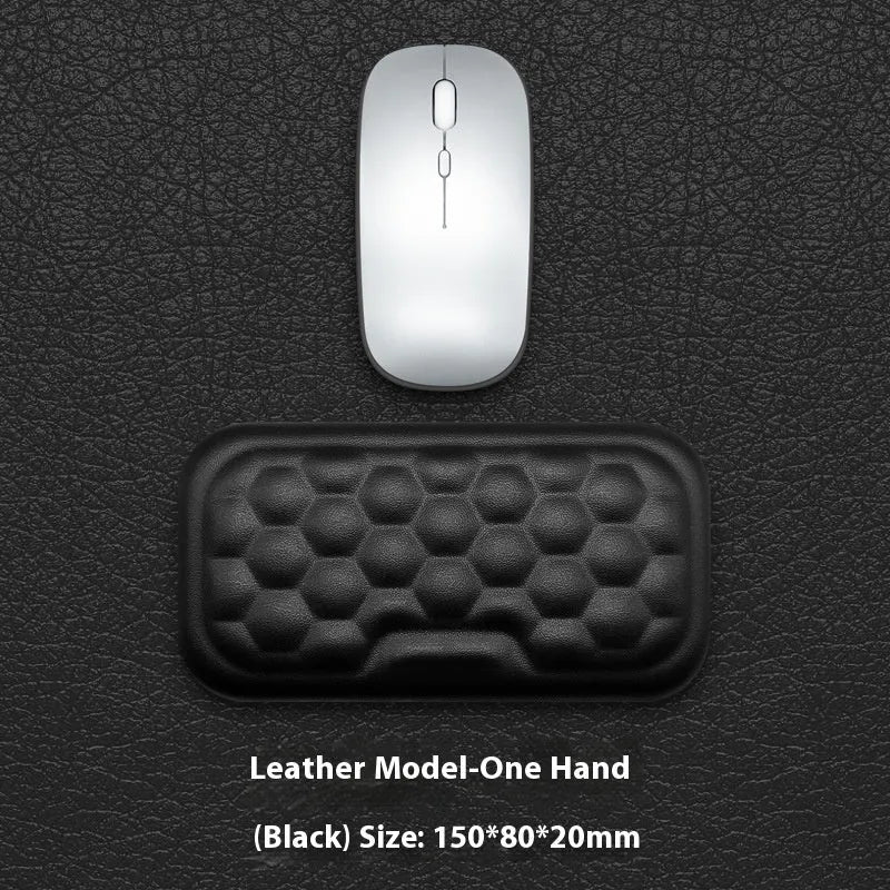 Memory foam mouse wrist rest pad with silicone base in black cloth cover option on desk