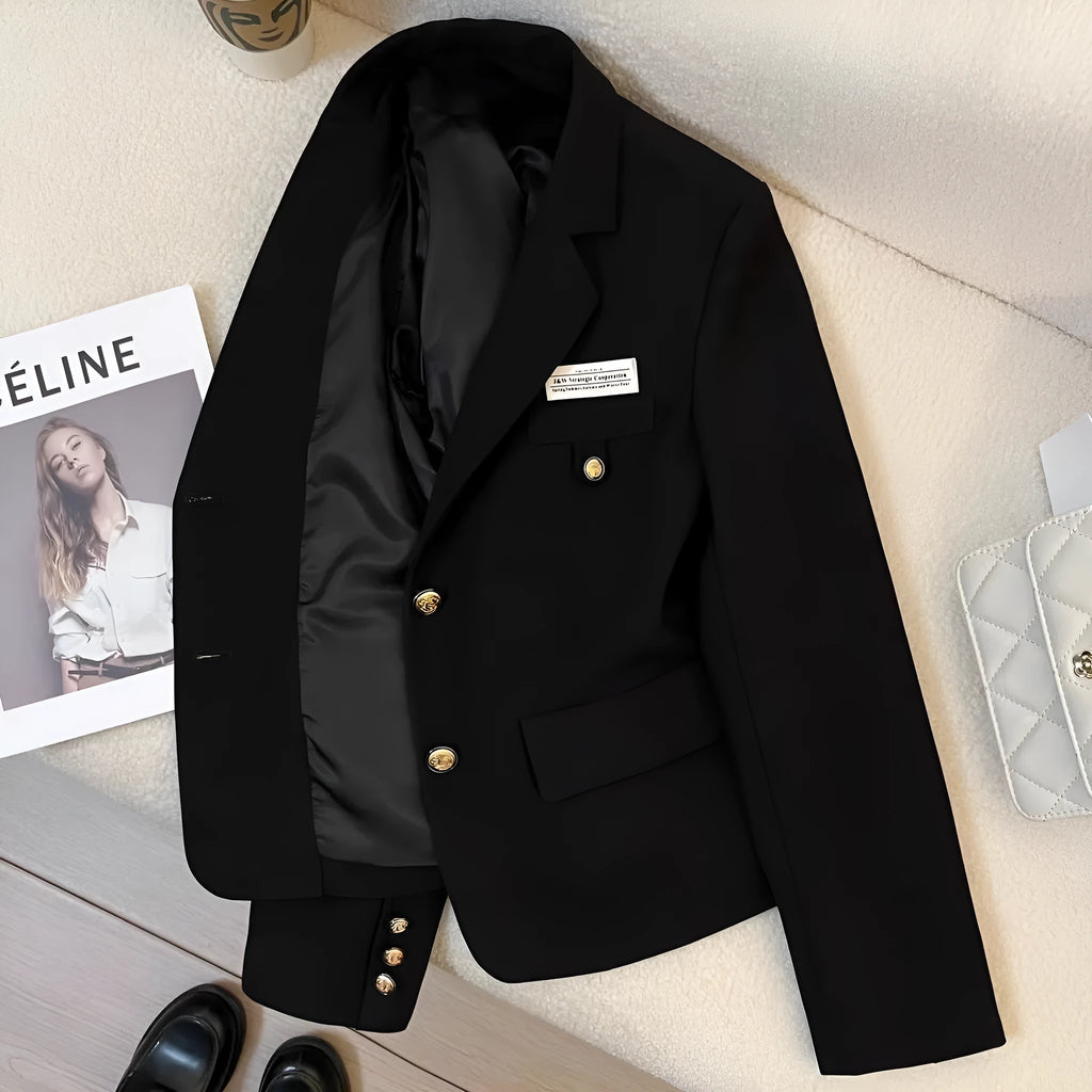 Black women's loose-fit short coat jacket with pockets and regular long sleeves.