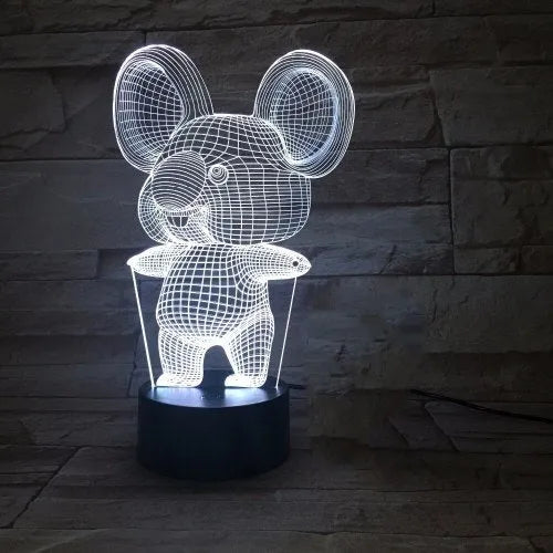 Black koala-shaped LED night light on a table showing multi-colour glow option.
