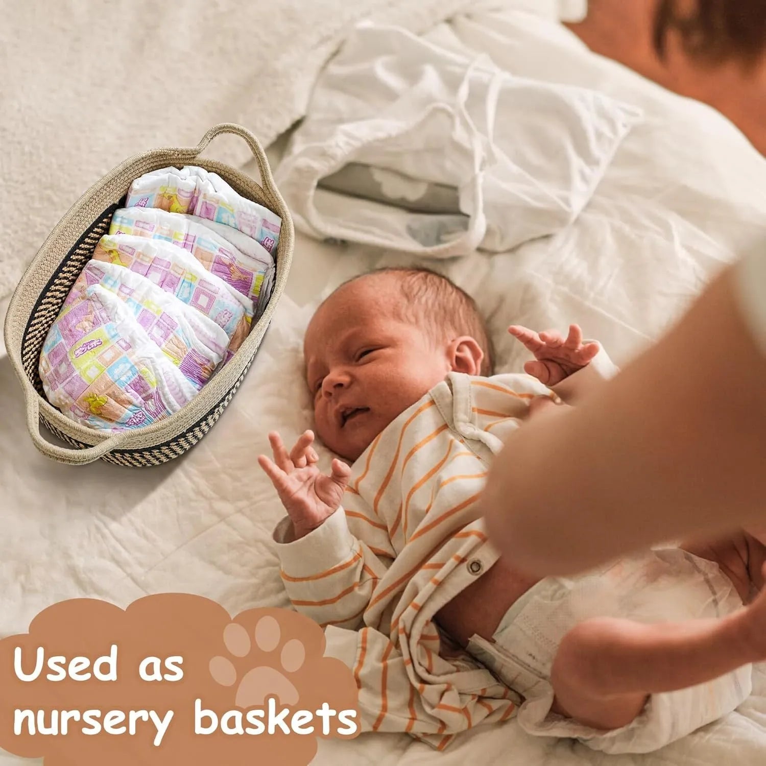 Light beige handmade cotton rope storage basket with handle, shown with toys inside.