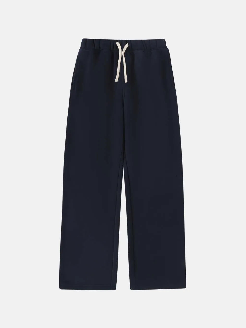 Man wearing black fleece-lined loose-fit sweatpants with an elastic drawstring waist