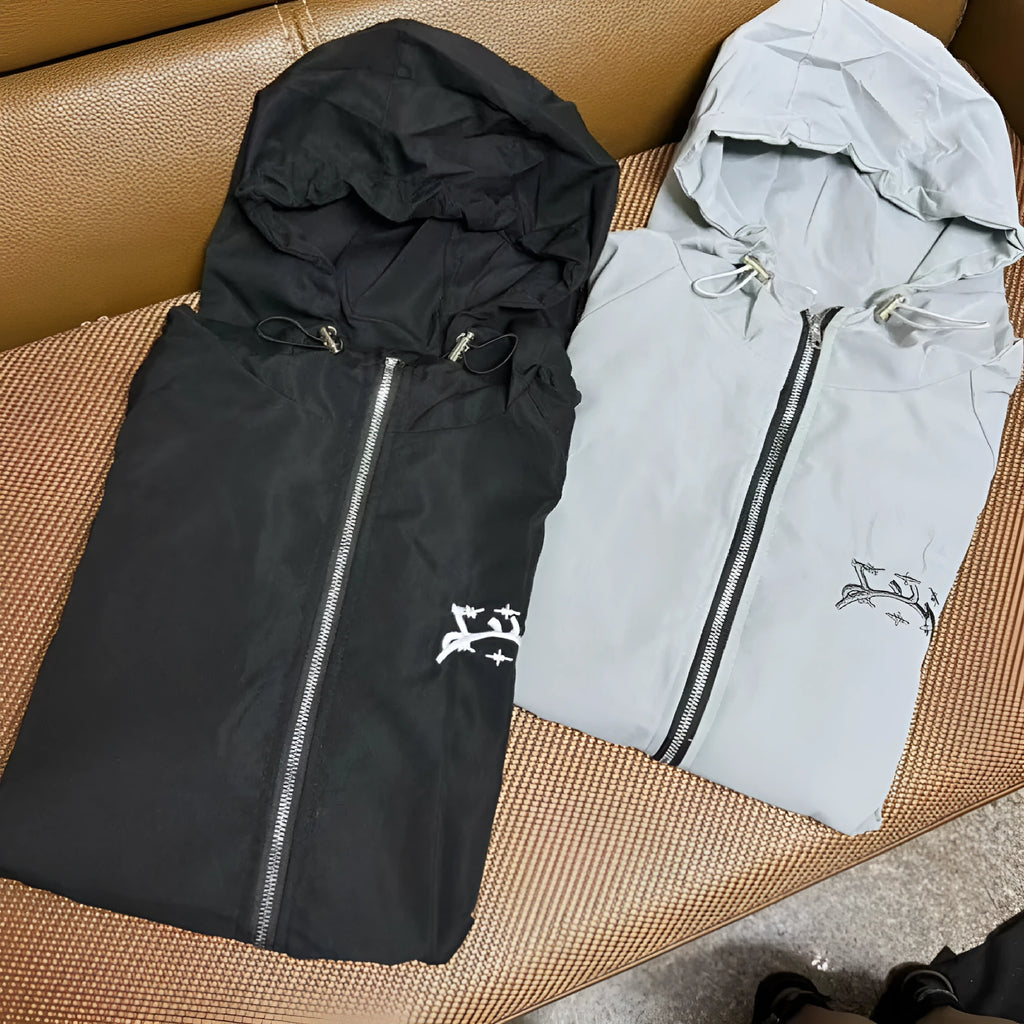 Men's grey hooded sunscreen jacket in British loose style shown on model