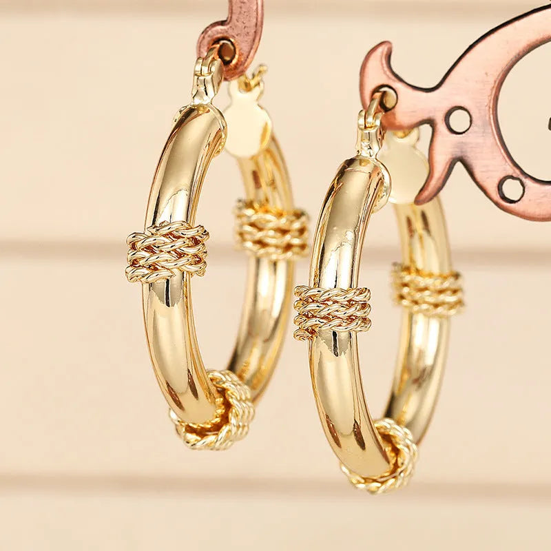 Women's geometric ring line copper earrings in golden colour variations