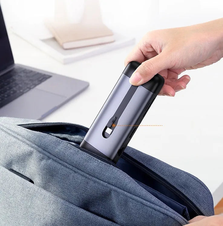 USB-C dock expansion adapter showing multiple ports including HDMI, USB 3.0, and Power Delivery charging
