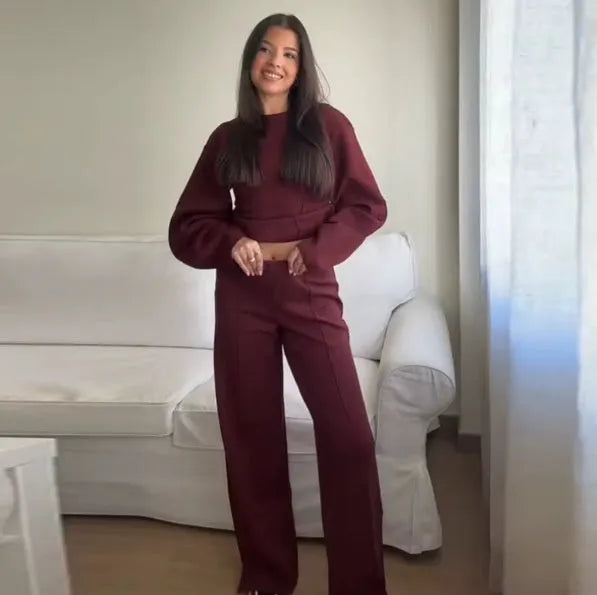 Women's polar fleece two-piece suit set showing long sleeve O-neck top with wide-leg trousers
