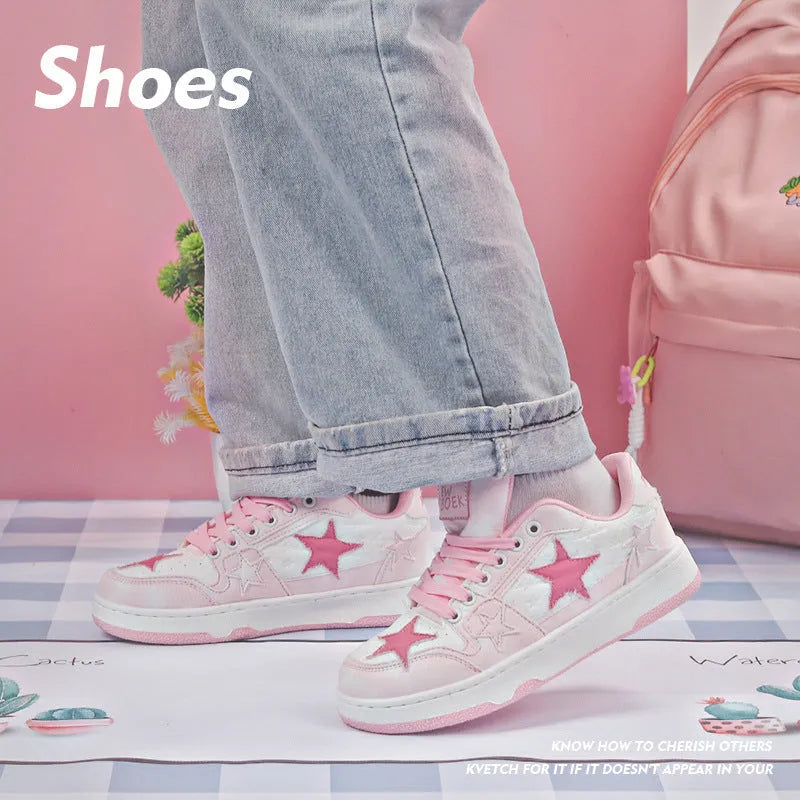A pair of denim lace-up skate shoes with a rubber sole, shown in black, green, and pink colour options.