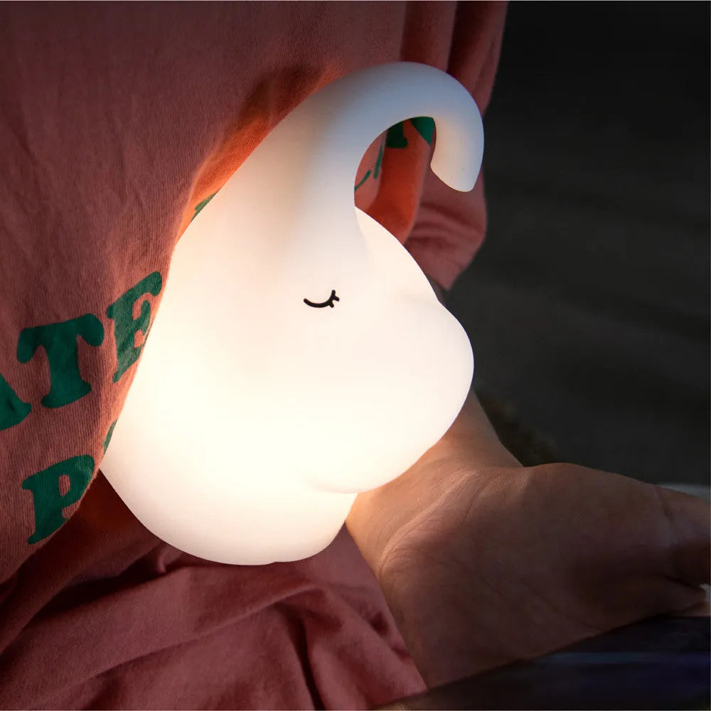 DOMI elephant-shaped silicone night light with dimmer control on bedside table