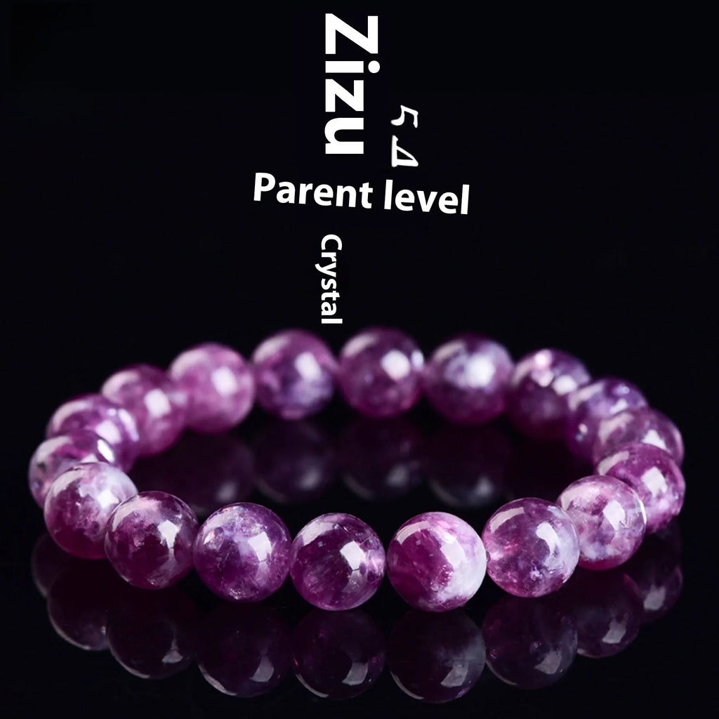 Grandmother Crystal bracelet with purple geometry-shaped beads on a wrist.