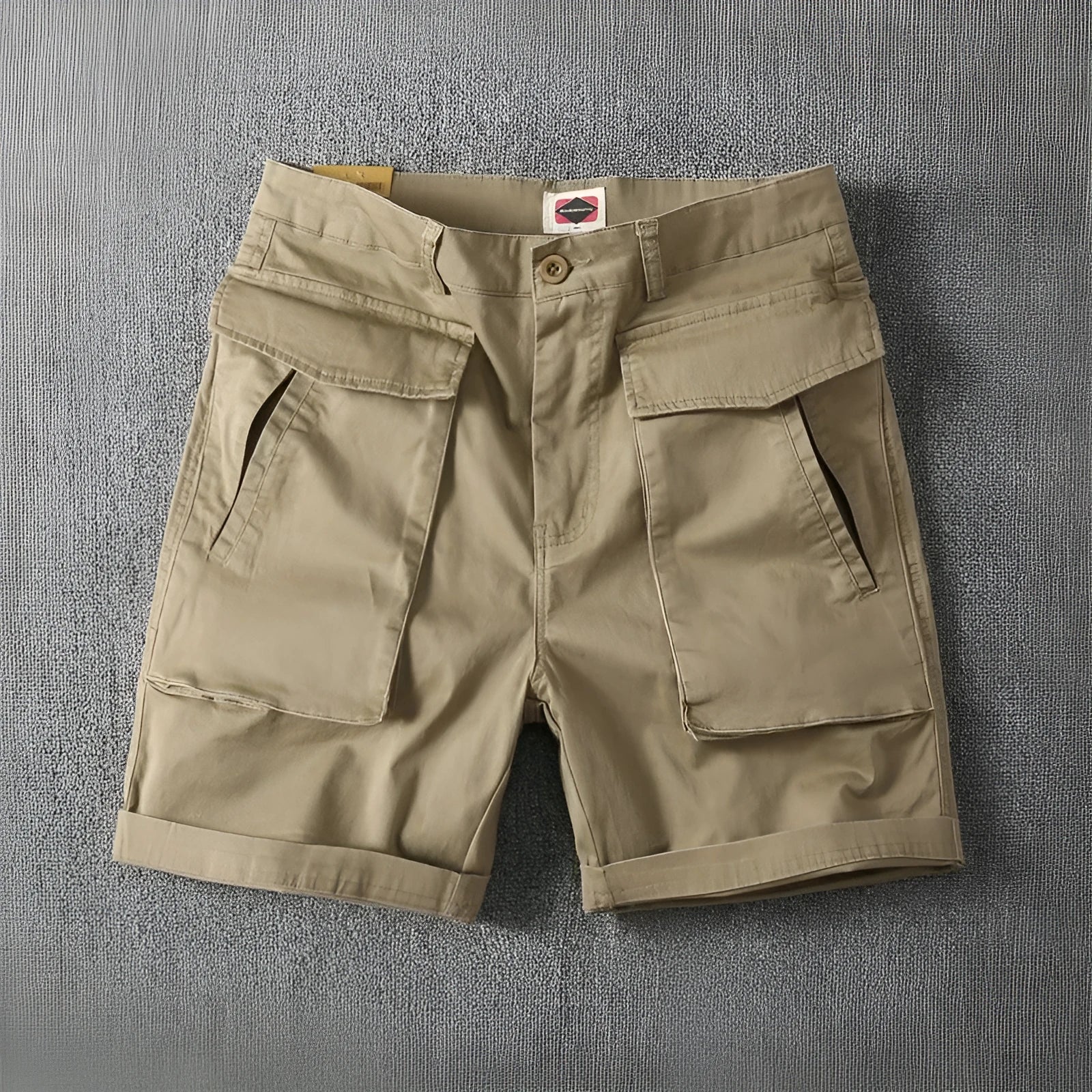Men's army green cotton cargo shorts with multiple pockets on a straight leg.