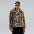 Women's leopard print coat with buckle lapel detail showing normal length street fashion design