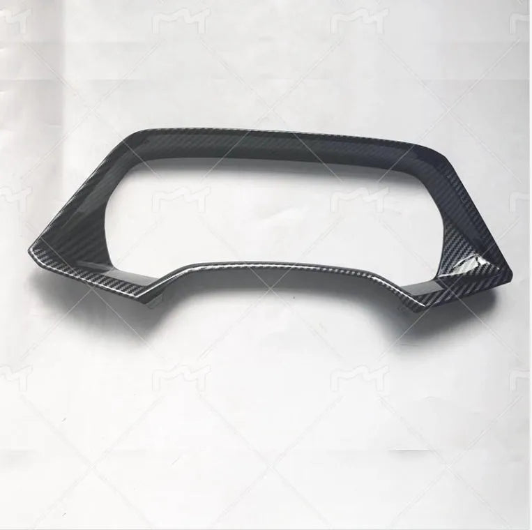 Dashboard decorative frame for BMW X5L in carbon fibre and peach wood finish options.