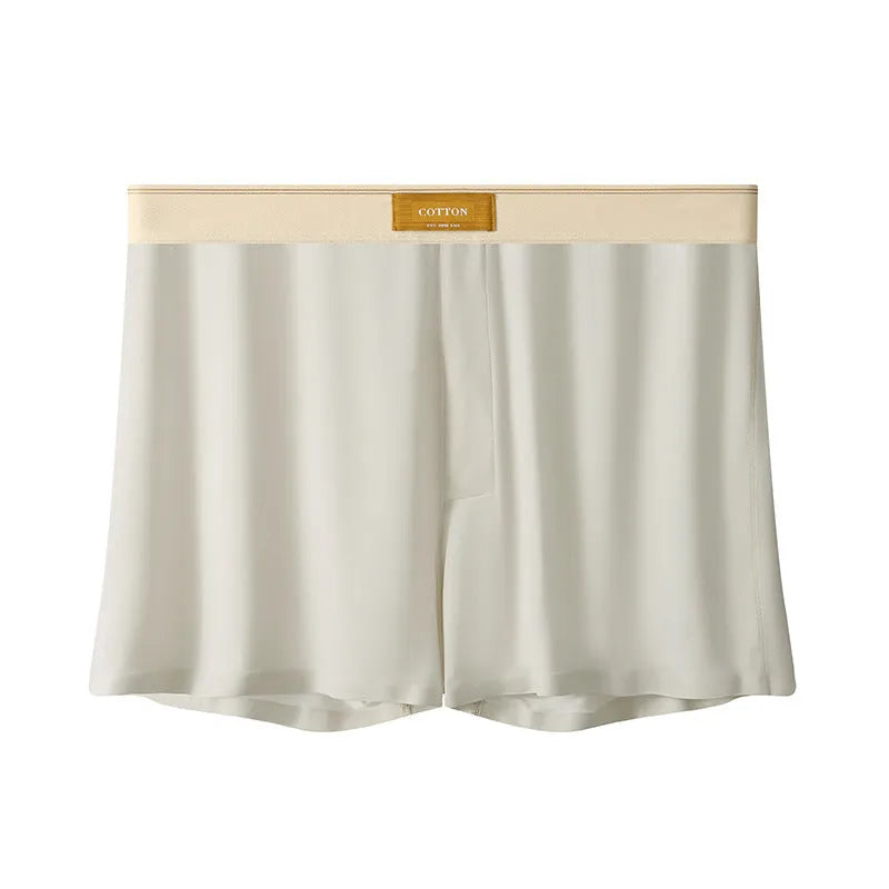 Men's loose fit ice silk underwear in solid colours showing mid-waist design and breathable fabric texture.