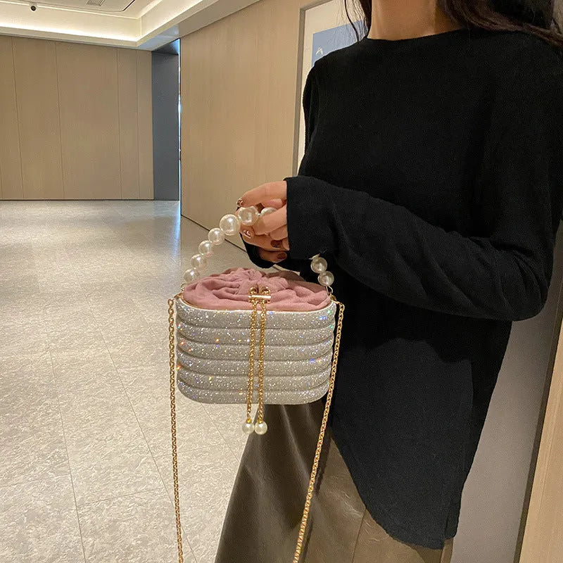 Round women's crossbody bag in PU leather with pearl bead decoration and single shoulder strap