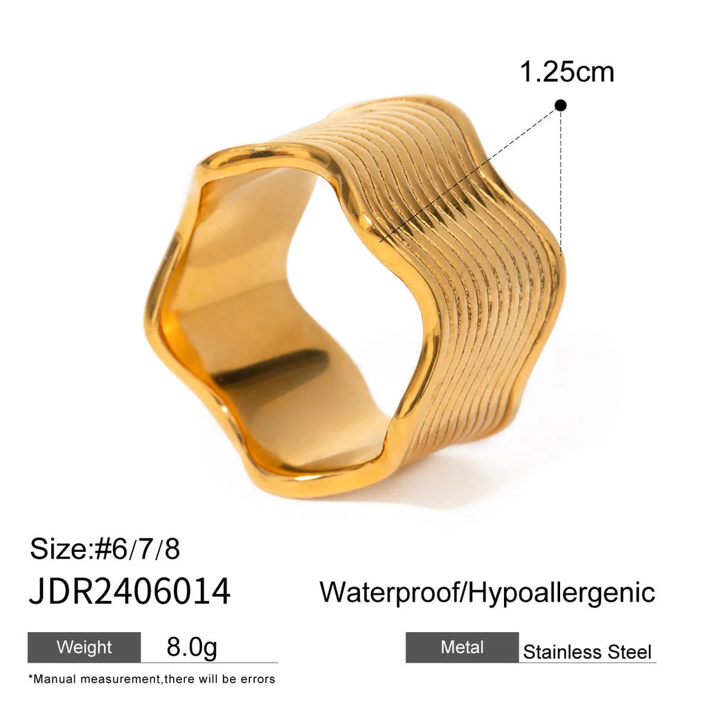 Stainless steel wide band ring with geometric wave pattern design