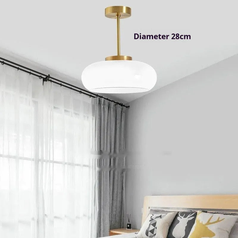 Bauhaus three-headed glass egg tart pendant light in retro style, shown in milk white.