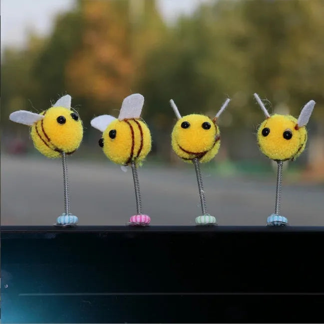 Swing Spring Bee car dashboard decoration showing cartoon bee design on fur ball material