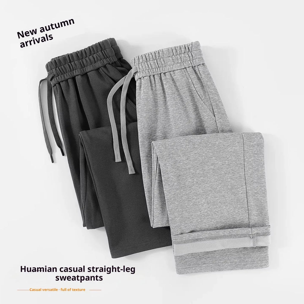 High-waisted casual straight-leg cotton sweatpants in loose fit, available in multiple colours