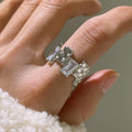 Silver geometric cross ring with open zircon gemstone design and three-dimensional decoration