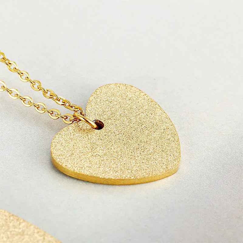 Titanium steel necklace with geometric heart-shaped pendant in colour KN25736Z