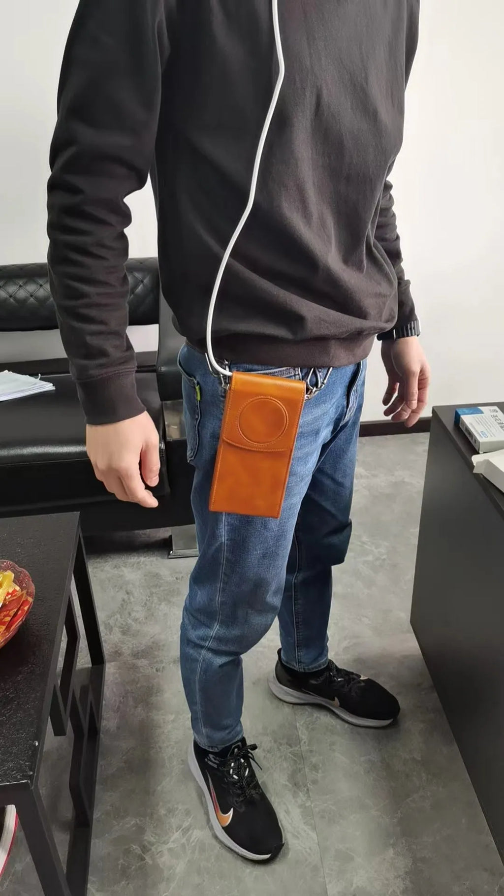 Brown leather storage bag for Apple Vision Pro power supply
