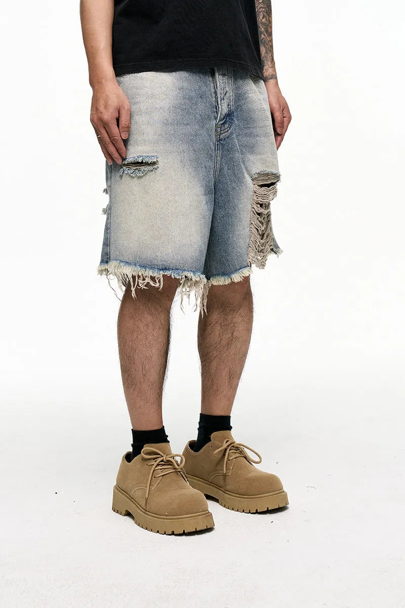 Men's light blue baggy denim shorts with wide leg design and mid waist