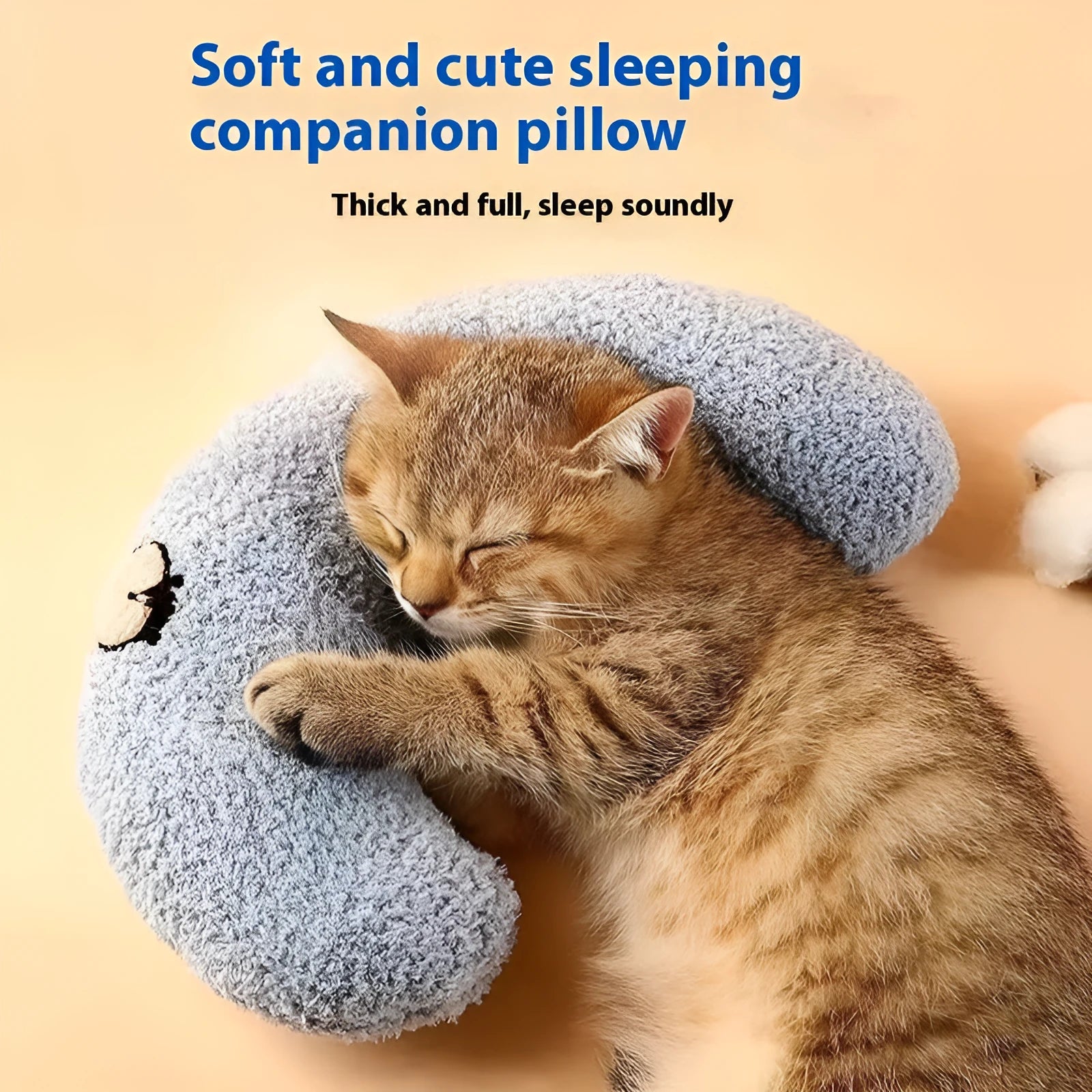 Blue cat sleeping mat with a U-shaped question mark pillow for neck support