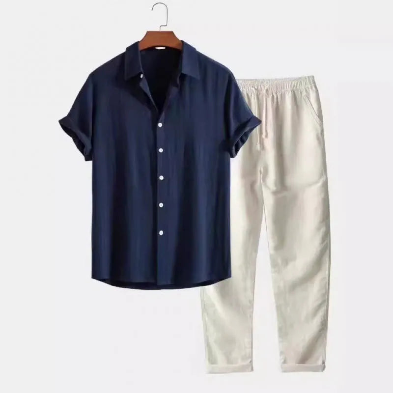 Men's light coloured linen-look casual short sleeve shirt and trouser two-piece suit set on a hanger.