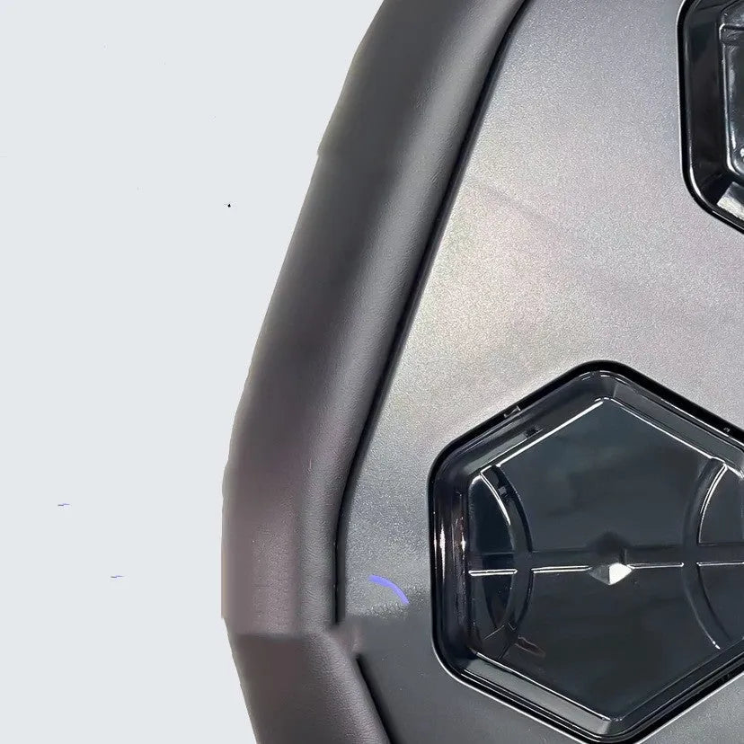 Black smart boxing machine with Bluetooth connectivity and included gloves on flat surface