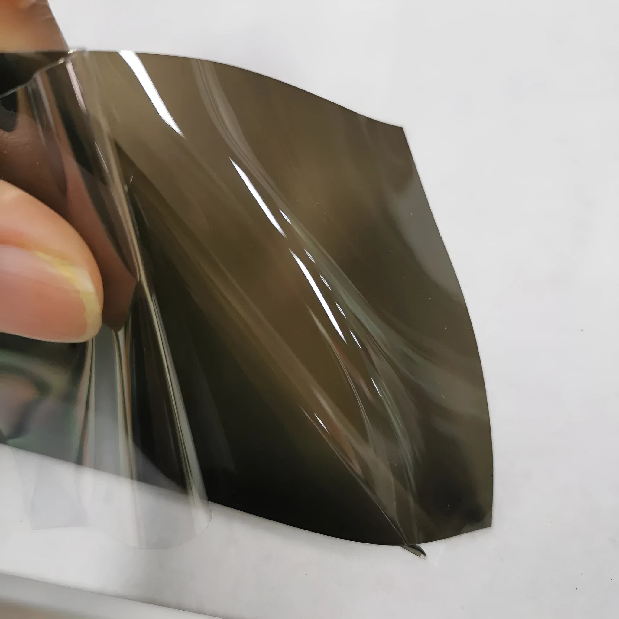 30cm wide plastic car lamp protective film on LED headlight showing transparent protection
