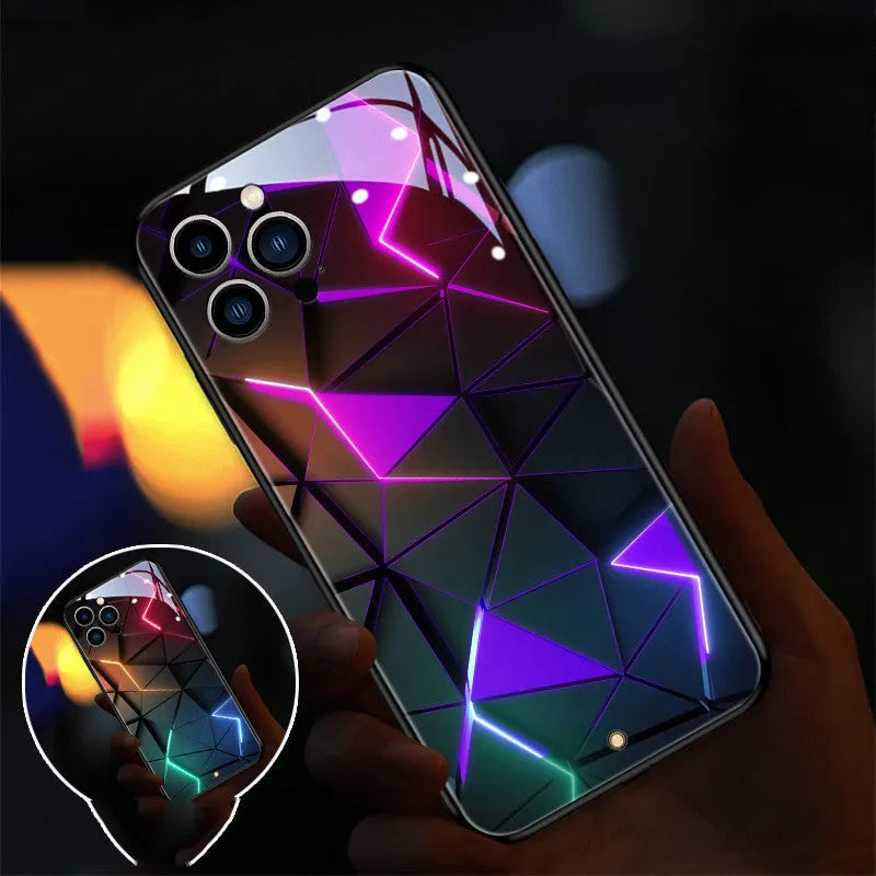 Xpress 14 clear tempered glass iPhone case with illuminated LED notification light on a table.