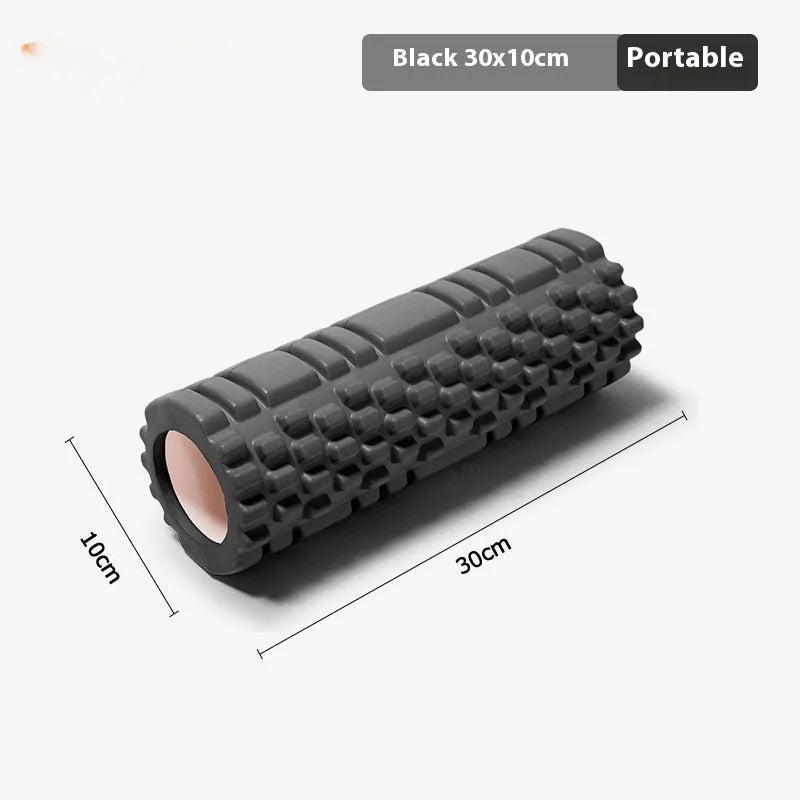 EVA foam roller in various colours including black, grey, pink, blue, and purple on fitness mat