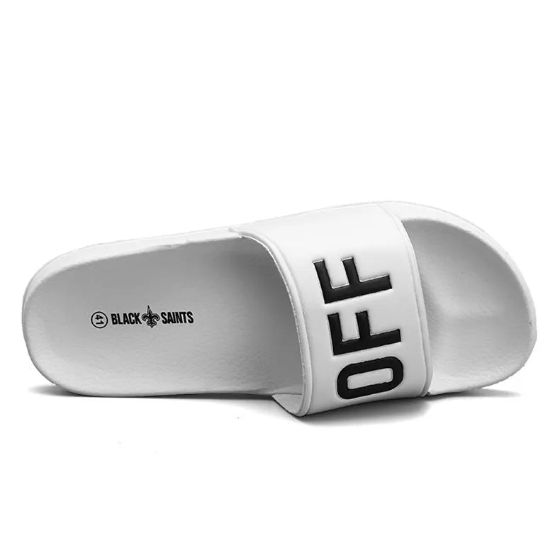 Men's open-toe slippers with rubber sole available in black and white colours for larger foot sizes
