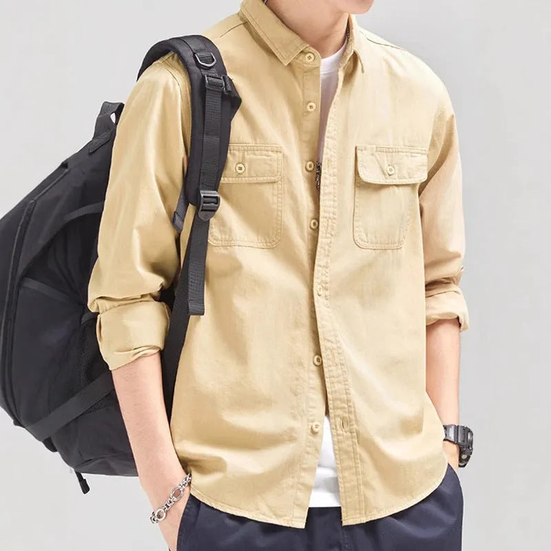 Man wearing loose fit long sleeve shirt overalls in cardigan style, made from polyester fabric