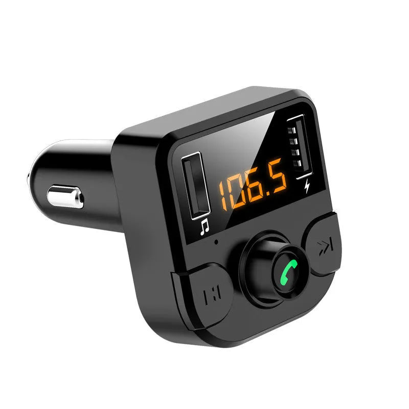 Black car Bluetooth FM transmitter plugged into vehicle cigarette lighter socket