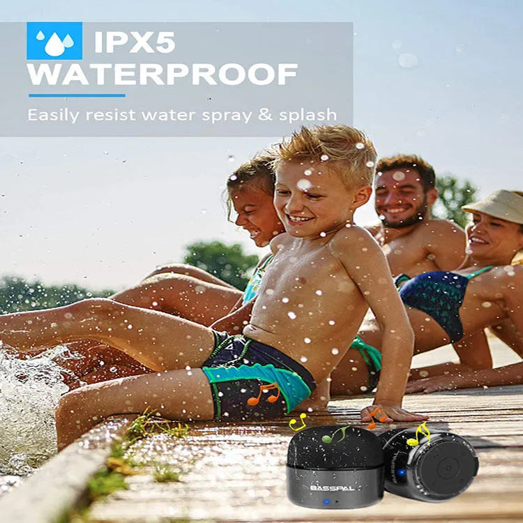 Black portable mini bluetooth speaker with waterproof rating and FM radio function
